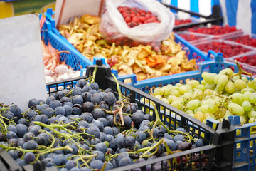 Black and green grapes on the market