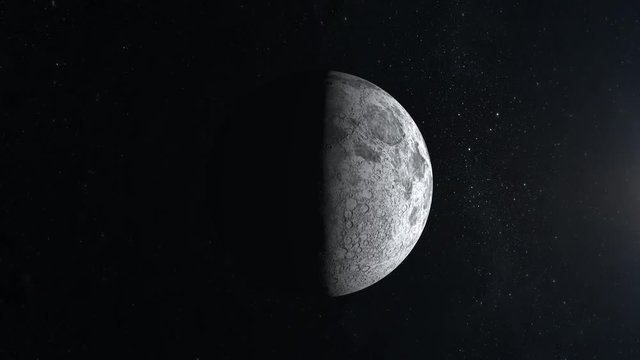 The moon is half illuminated by the sun. The moon is motionless and slowly approaching. View from space. Stars twinkle. 4K.