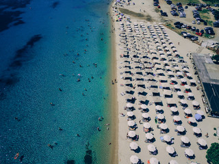 Beach with sun beds, view from above