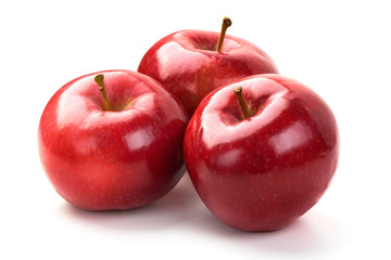 Red ripe apples, isolated on white background. Fresh raw organic fruits.