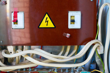 Old electrical panel on the wall. Industrial background.