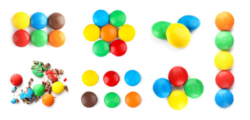 Set with colorful sweet candies on white background