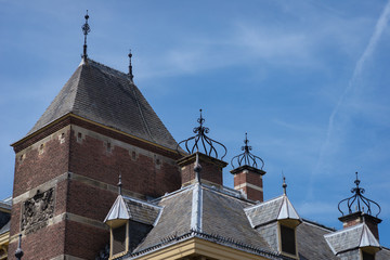 Fototapeta na wymiar Binnenhof Palace, details of Dutch Parliament in Hague in a beautiful summer day, The Netherlands