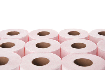 Many rolls of toilet paper on white background