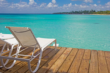 Summer holidays postcard: pier at the Caribbean sea