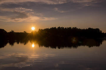 Obraz premium Sunset on Spider Lake in Northern Wisconsin.