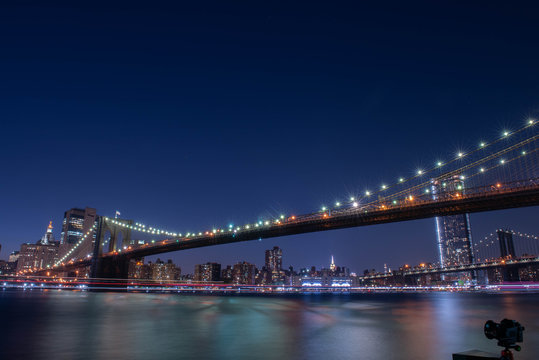 brooklyn bridge and Manhattan  at night