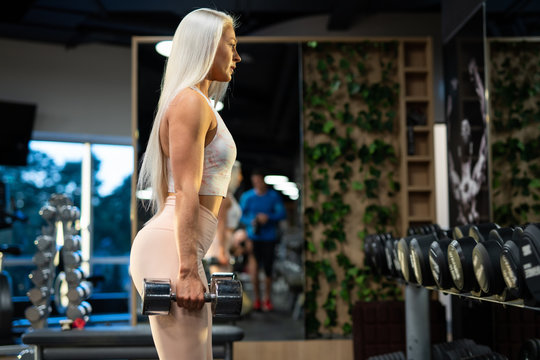 Sportswoman doing exercise in gym