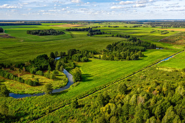 Fototapeta na wymiar Aerial view on rural landscape with a river