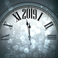 Fototapeta na wymiar Grey bokeh New Year 2019 background with silver clock.