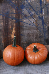 Pumpkins on wooden table.