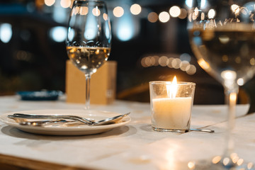 a glass of wine on the table