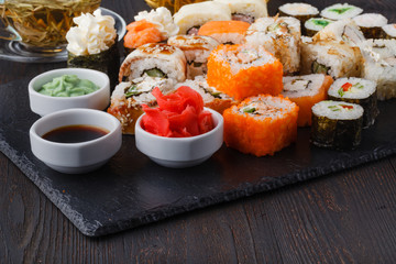 Various Roll with salmon, avocado, cucumber. Sushi menu. Japanese food