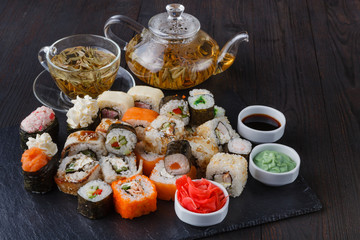 Japanese sushi set with green tea ready to serve