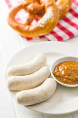 The bavarian weisswurst, pretzel and mustard.