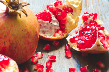 red pomegranate seeds and light

