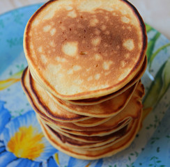 Big stack of ruddy pancakes