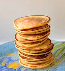 A stack of ruddy pancakes