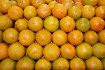 Texture and background of colorful oranges.