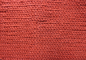 Fototapeta premium Knitted wool red background