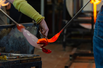 Glassworks glass manufacturing, process of forming a decorative product.