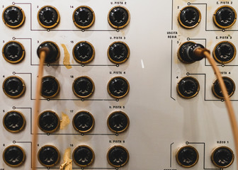 analog connectors on a vintage soundboard