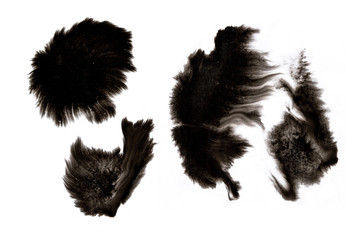 Abstract hand drawn ink spots set isolated on white background. Artistic design liquid paints for card, poster, invitation, website and banners. Monochrome dark colors