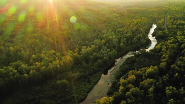 Aerial shot over Piscataquis River at Barrel Falls.