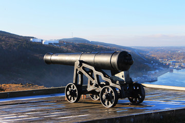 A frosty morning view of a cannon on Signal Hill overlooking St. John's Harbour, St. John's,...