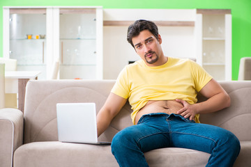 Man searching information in Internet in dieting concept 