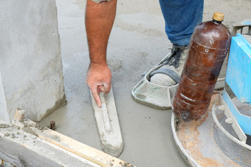 builders poured concrete at the construction site