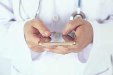 Asian women using her cell phone