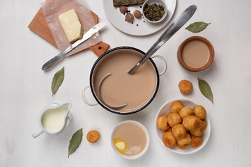 Asian traditional dish. Mongolian, Kalmyk, Buryat, Tibetan, Tuvan tea. Tea with milk, salt, butter, nutmeg, Bay leaf, black pepper. Cuisine of nomadic peoples.