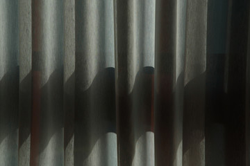 Soft sunlight and shadows passing through the curtains, abstract wallpaper, vertical lines