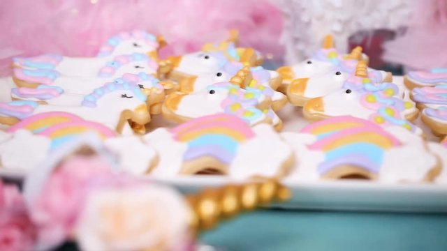 Unicorn sugar cookies decorated with royal icing at the kids birthday party