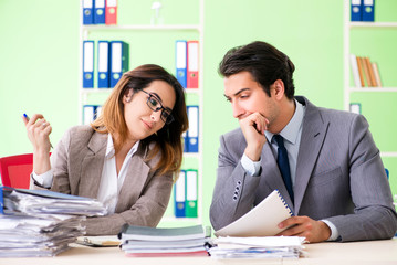 Two colleagues working in the office