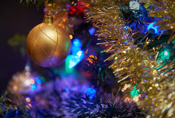 Obraz na płótnie Canvas Christmas Tree Decorations. Medium shot of ornaments on a Christmas tree.