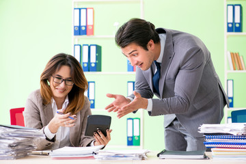 Two financial specialists working in the office