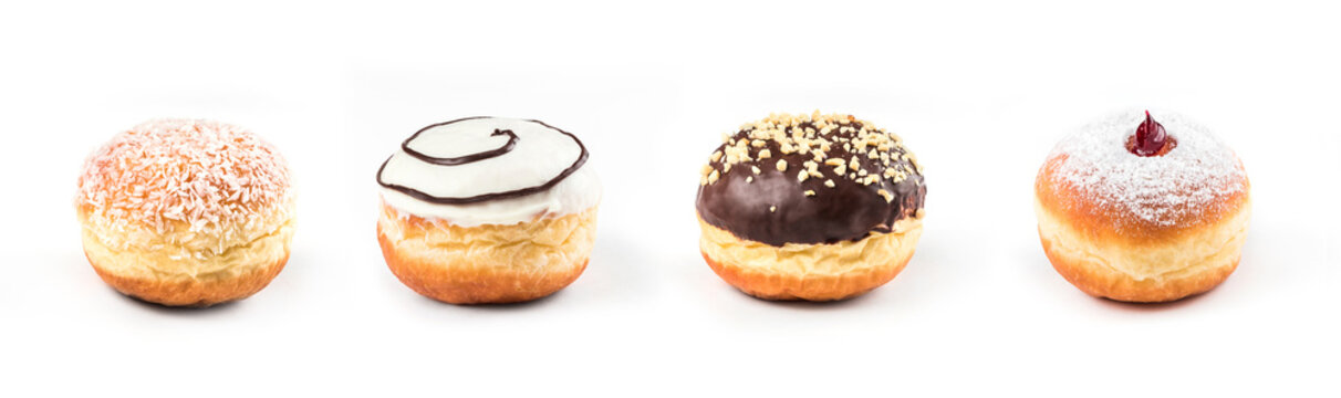 Collection of delicious doughnuts side by side isolated on white background, view from side