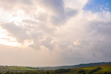 sky with heavy, fluffy clouds in the rain