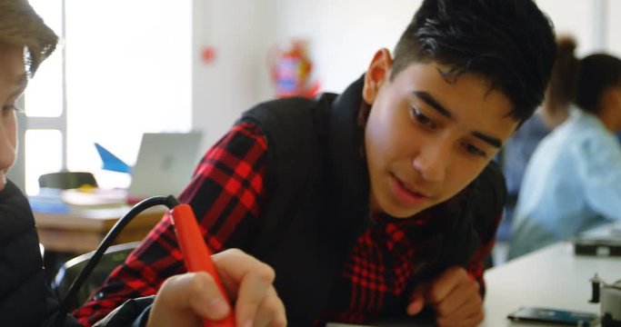 Kids working on a project in the training institute 4k