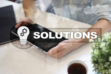 Business solutions concept on the virtual screen.