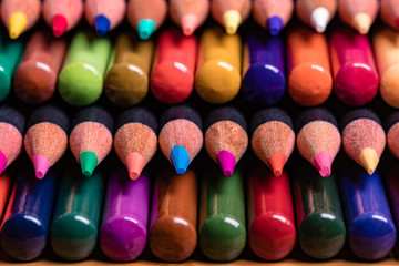 Neatly Stacked Colored Pencils with Points and Butts in opposing rows