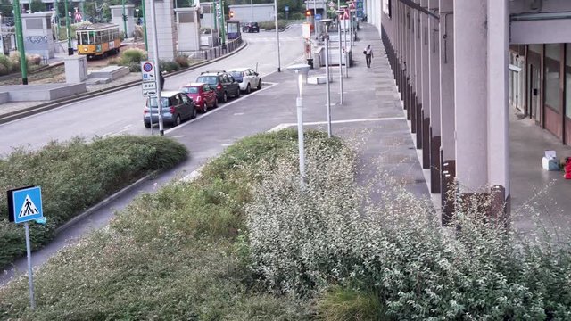 homeless sleps on the street in milan city at morning