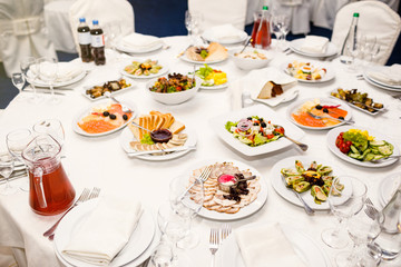 Beautifully decorated catering banquet table with different food