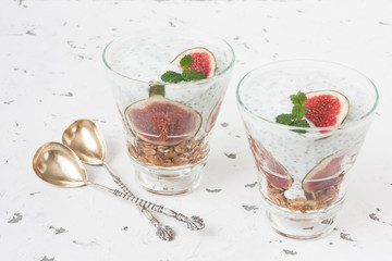Chia seeds pudding parfait / Chia seeds pudding parfait with yogurt, figs, oatmeal granola, and...