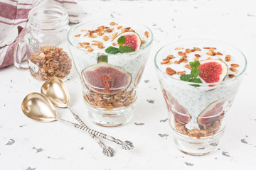 Chia seeds pudding parfait / Chia seeds pudding parfait with yogurt, figs, oatmeal granola, and...
