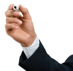 Fototapeta premium Closeup of a Businessman Writing on the Air