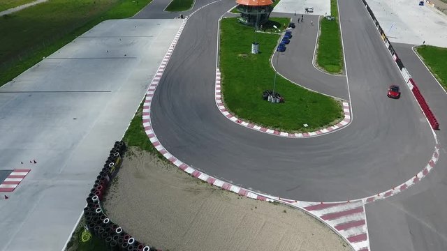 Aerial footage of the Titi Aur racetrack as a driver learns to speed around the curves.
