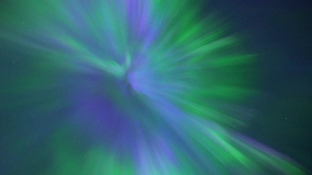 Real time video of Northern Lights or Aurora Borealis dancing in a clear night skies. This is a rare case of so called corona with greens, purple and blue colours, really rare for the auroras.